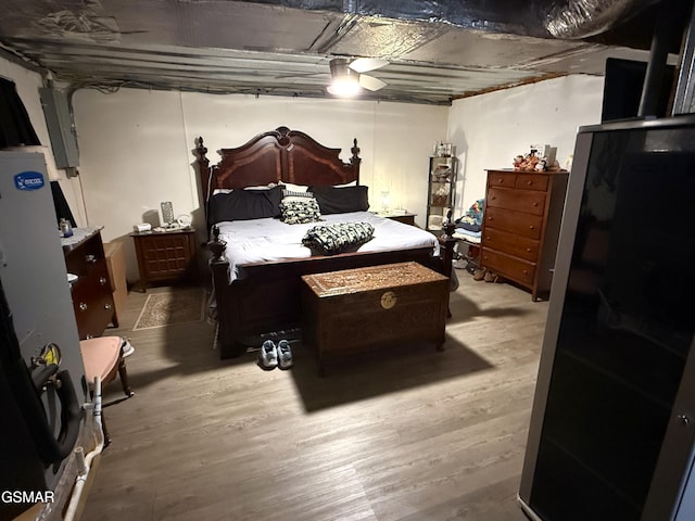 bedroom featuring wood finished floors