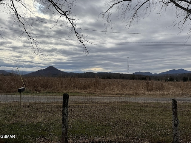 property view of mountains featuring a rural view