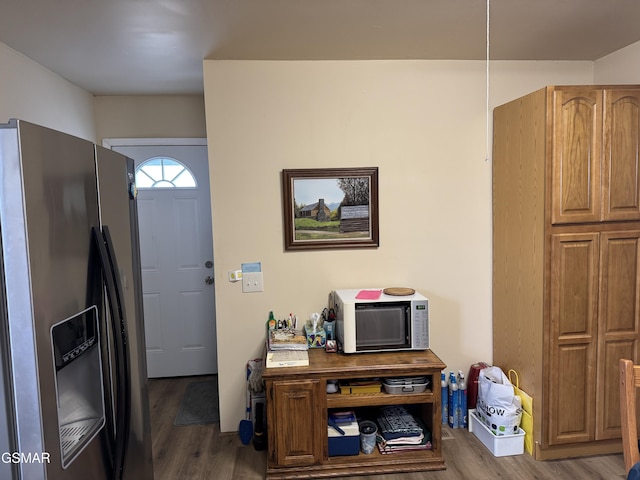 interior space with dark hardwood / wood-style floors