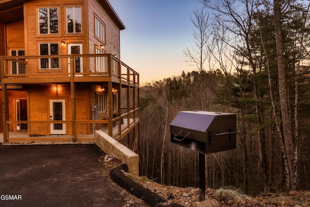 view of property exterior at dusk