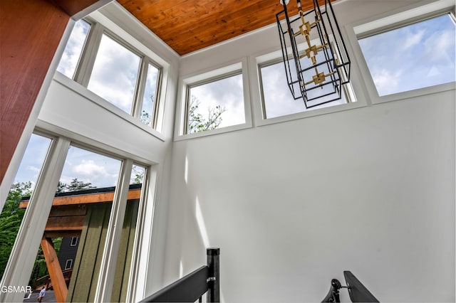 2385 Forge Hideaway Loop Unit 2, Pigeon Forge, TN 37863 - staircase featuring healthy amount of natural light, wood ceiling, and a towering ceiling