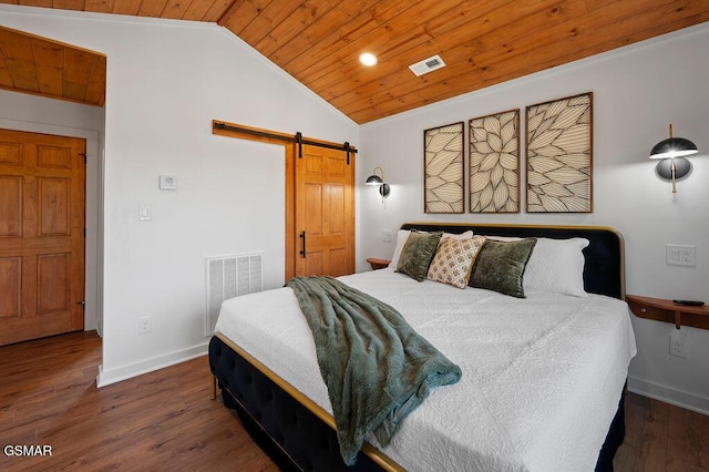 bedroom with wooden ceiling, a barn door, dark hardwood / wood-style floors, and lofted ceiling