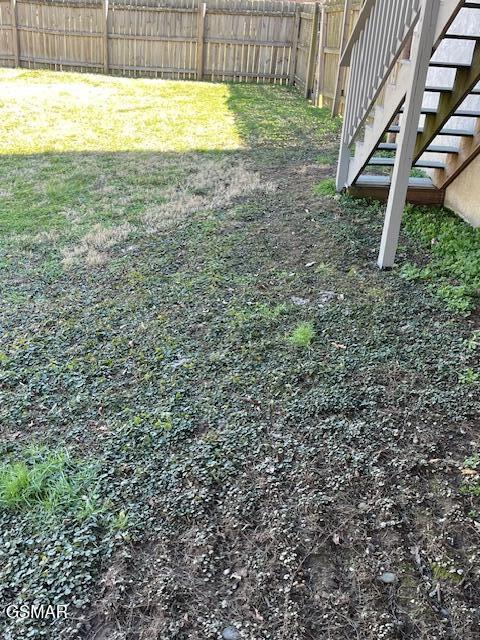 view of yard featuring a fenced backyard