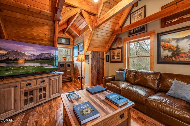 living area with vaulted ceiling with beams, wooden ceiling, and dark wood-style flooring