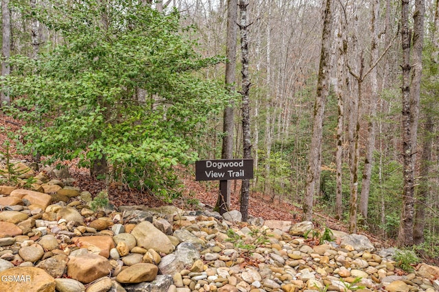 exterior details featuring a forest view