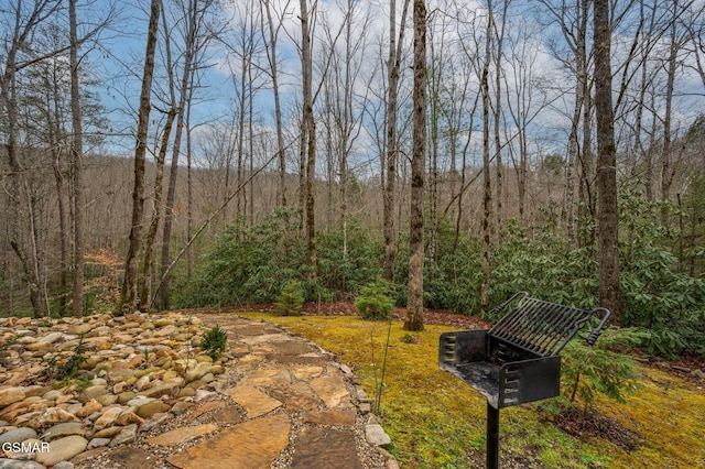 surrounding community with a view of trees