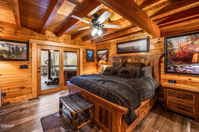 bedroom with dark wood-style flooring, wood walls, wood ceiling, and access to outside