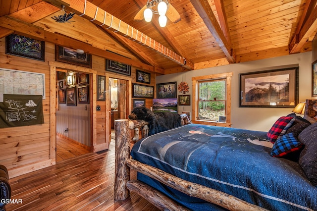 bedroom featuring wooden walls, wooden ceiling, lofted ceiling with beams, and hardwood / wood-style floors