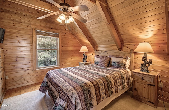 1482 Red Cedar Ln Unit 64, Sevierville, TN 37876 - bedroom featuring light carpet, wood ceiling, wooden walls, and ceiling fan