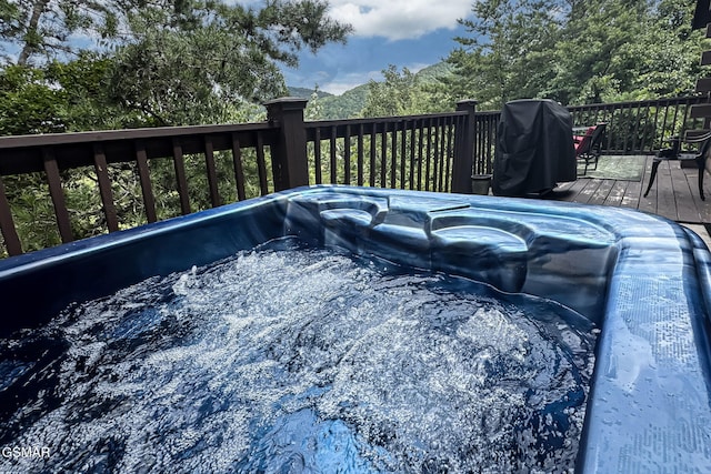 1482 Red Cedar Ln Unit 64, Sevierville, TN 37876 - view of pool featuring a wooden deck, grilling area, and a hot tub