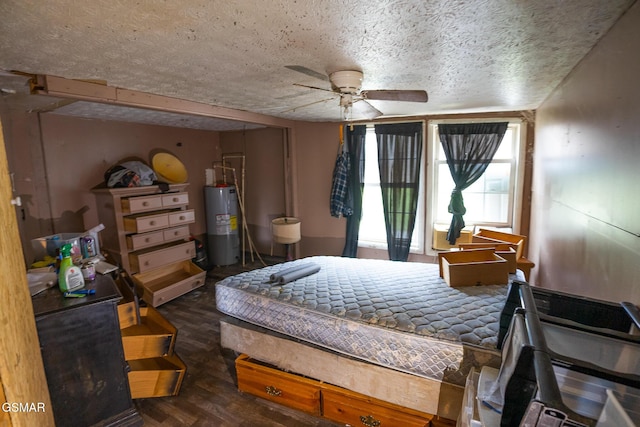 bedroom with a textured ceiling, ceiling fan, wood finished floors, and electric water heater