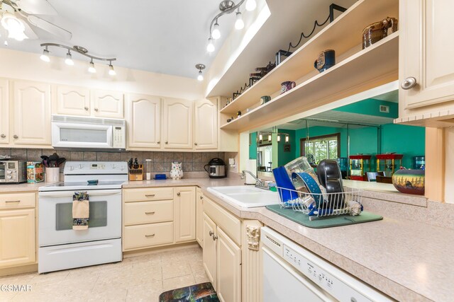 1704 Hidden Hills Rd Unit 504, Gatlinburg, TN 37738 - kitchen featuring white appliances, open shelves, a sink, backsplash, and light countertops