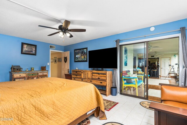 1704 Hidden Hills Rd Unit 504, Gatlinburg, TN 37738 - bedroom featuring light tile patterned floors and ceiling fan