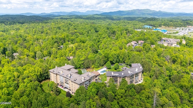 1704 Hidden Hills Rd Unit 504, Gatlinburg, TN 37738 - drone / aerial view of a forest and a mountainous background