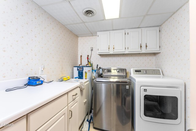 1704 Hidden Hills Rd Unit 504, Gatlinburg, TN 37738 - laundry room featuring wallpapered walls, independent washer and dryer, and cabinet space
