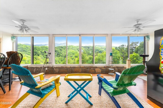 1704 Hidden Hills Rd Unit 504, Gatlinburg, TN 37738 - sunroom with healthy amount of natural light and a view of trees