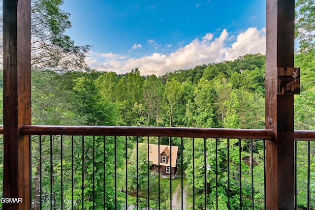1013 Silver Poplar Ln, Sevierville, TN 37876 - balcony featuring a wooded view