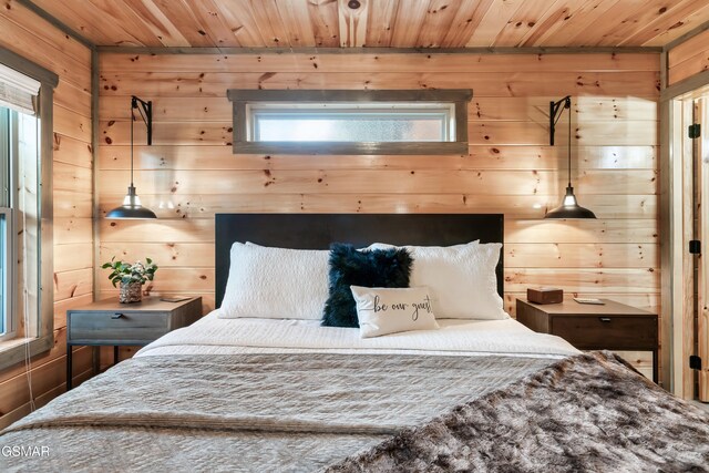 1013 Silver Poplar Ln, Sevierville, TN 37876 - bedroom with wooden walls and wood ceiling