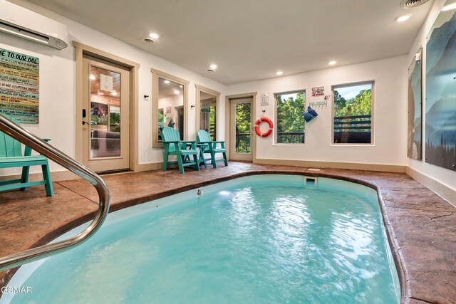 1013 Silver Poplar Ln, Sevierville, TN 37876 - indoor pool featuring a wall mounted air conditioner
