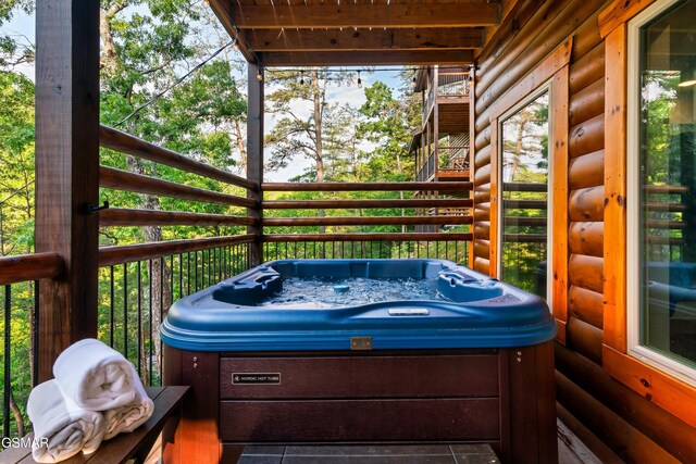 1013 Silver Poplar Ln, Sevierville, TN 37876 - wooden deck with a hot tub