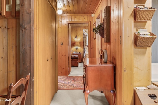 2537 Waldens Creek Rd, Sevierville, TN 37862 - hall featuring wood walls, wood ceiling, and light carpet