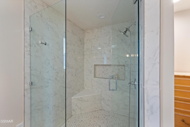 bathroom with an enclosed shower