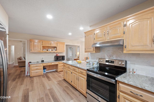 kitchen with decorative backsplash, appliances with stainless steel finishes, light brown cabinetry, light stone counters, and light hardwood / wood-style floors