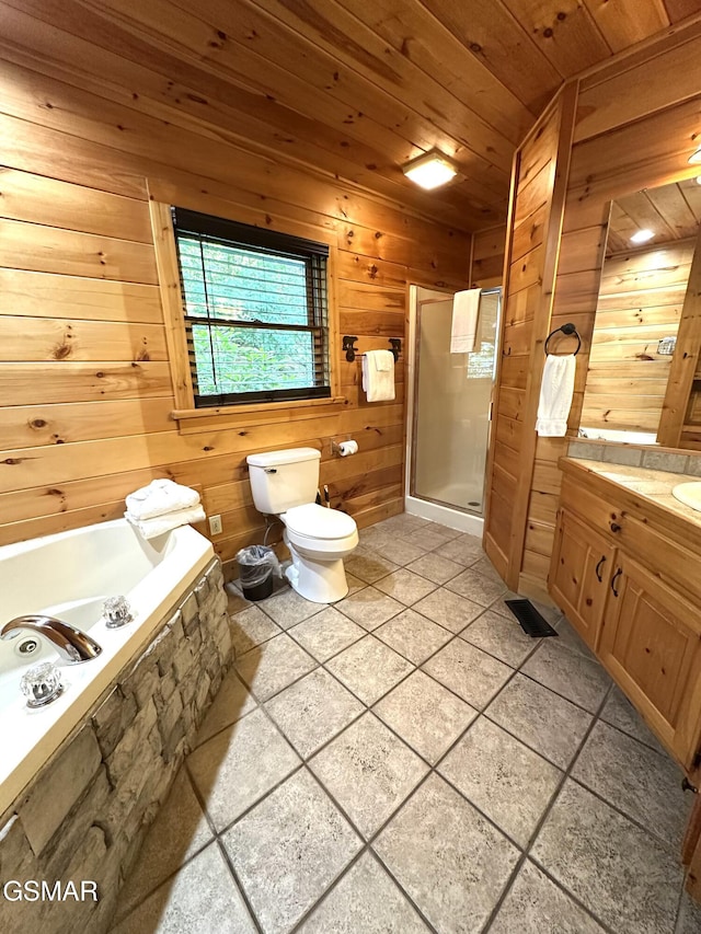 2973 Mockingbird Way, Sevierville, TN 37862 - bathroom with wood ceiling, a shower stall, wooden walls, vanity, and toilet