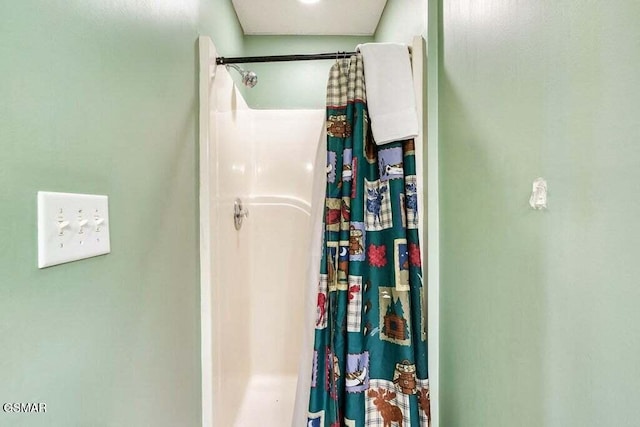 bathroom with walk in shower