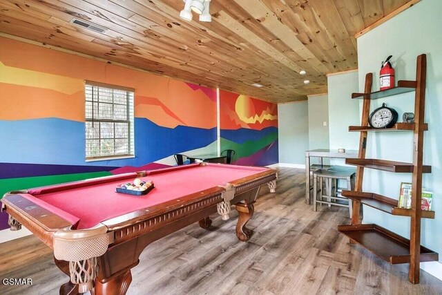 rec room with wood ceiling, visible vents, baseboards, and wood finished floors