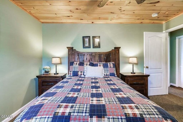 bedroom featuring carpet flooring and wood ceiling