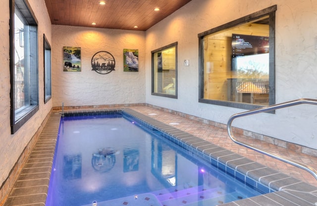 view of pool featuring an indoor hot tub