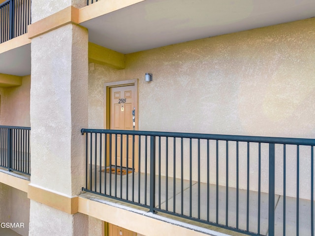 doorway to property with a balcony