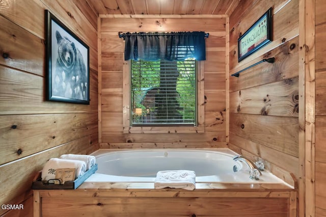 1502 Sky View Dr, Sevierville, TN 37876 - bathroom with a bath, wood walls, and wood ceiling