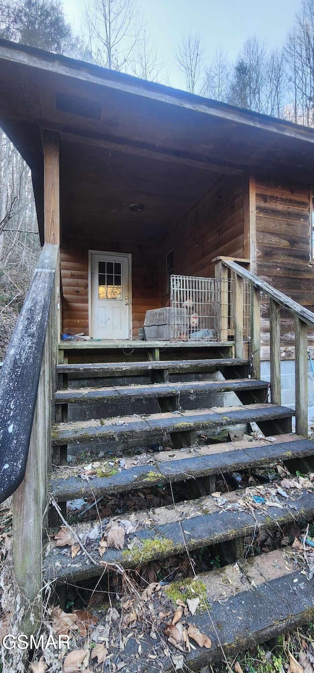 doorway to property with a porch