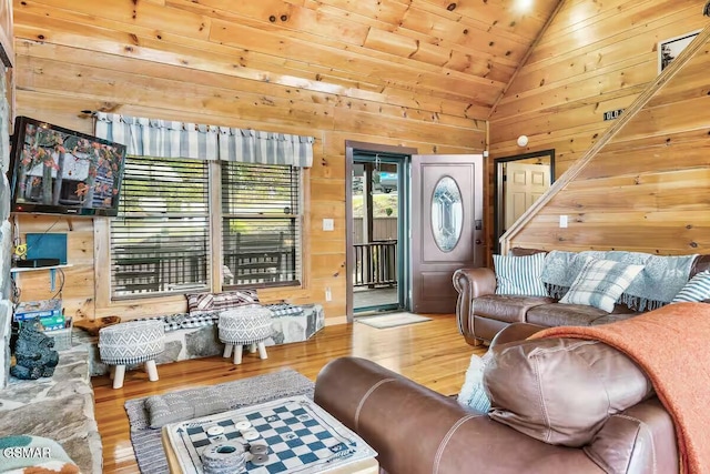 3933 Glenview Way, Sevierville, TN 37862 - living room featuring lofted ceiling, wood finished floors, wooden walls, and wood ceiling