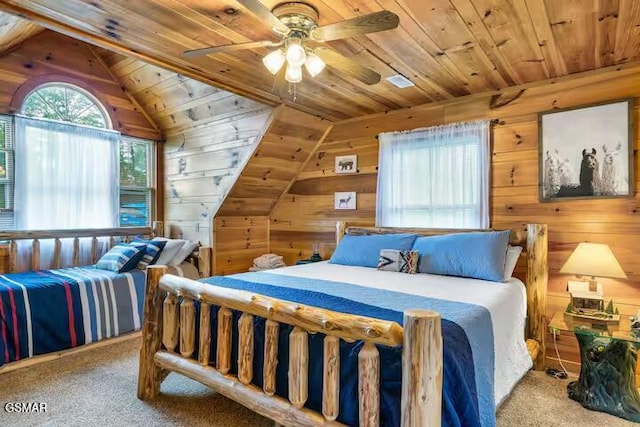 3933 Glenview Way, Sevierville, TN 37862 - carpeted bedroom with wooden ceiling, wood walls, and lofted ceiling