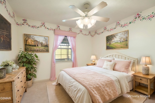 bedroom featuring a ceiling fan and baseboards