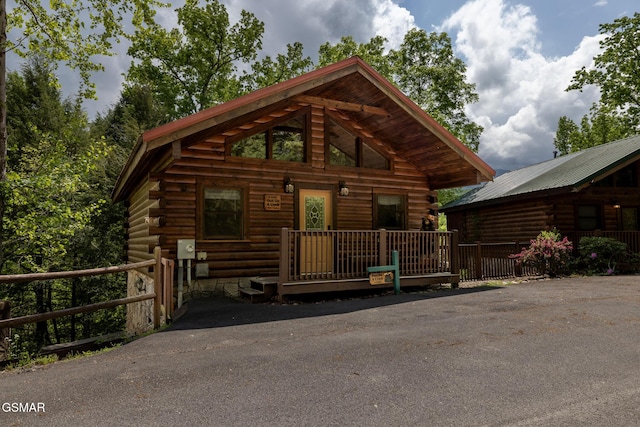 log cabin featuring log exterior