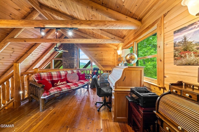office featuring healthy amount of natural light, wooden ceiling, hardwood / wood-style floors, and wood walls