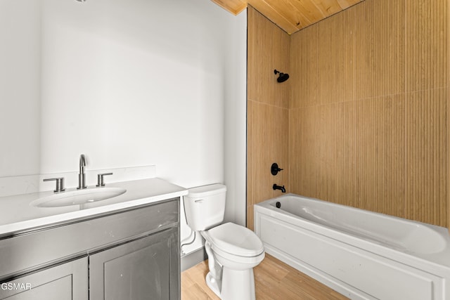 1409 Reedmont Way, Sevierville, TN 37876 - full bathroom featuring vanity,  shower combination, and wood finished floors