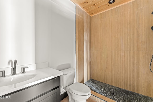 1409 Reedmont Way, Sevierville, TN 37876 - full bath featuring tiled shower, wooden ceiling, and vanity