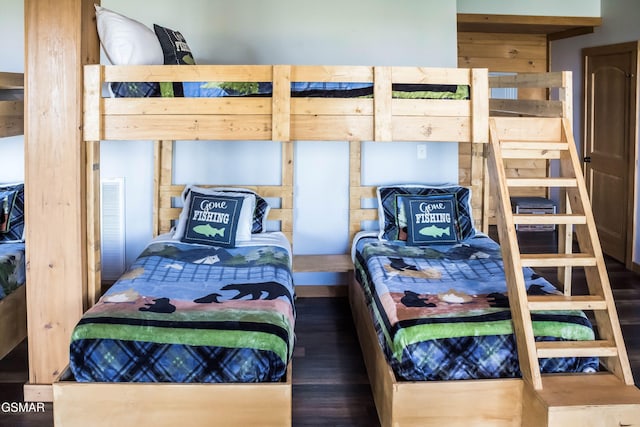 bedroom featuring dark wood-type flooring