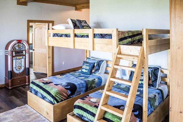 bedroom featuring dark wood-type flooring