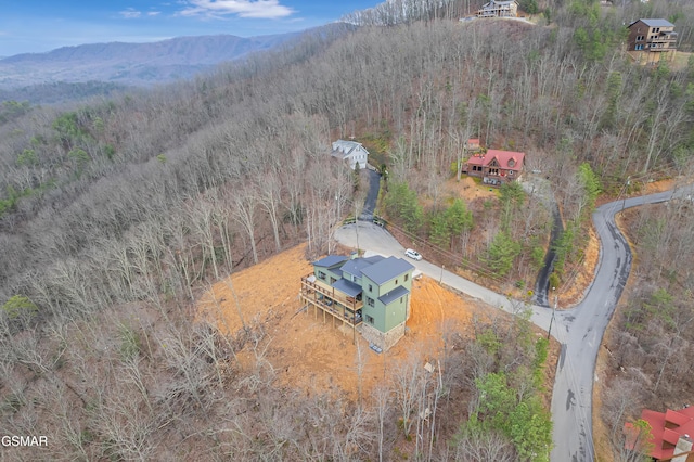 1505 Misty Ct, Sevierville, TN 37862 - aerial view of property and surrounding area with a mountainous background and a heavily wooded area