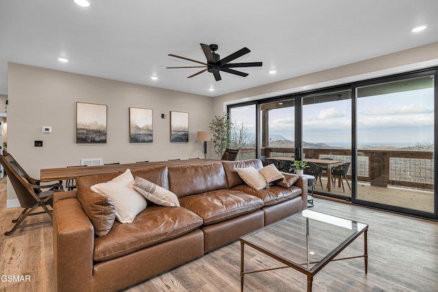 1505 Misty Ct, Sevierville, TN 37862 - living area featuring light wood-style floors, ceiling fan, and recessed lighting