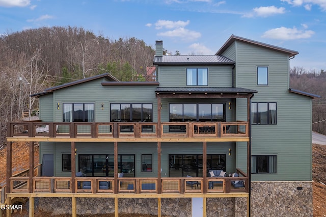 1505 Misty Ct, Sevierville, TN 37862 - back of property with a balcony and a metal roof