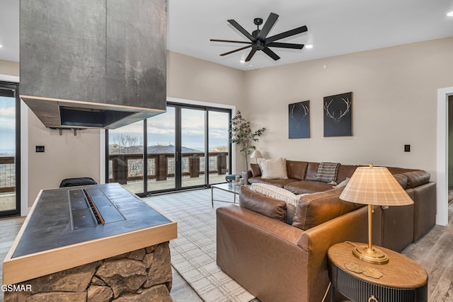 1505 Misty Ct, Sevierville, TN 37862 - living area with ceiling fan, plenty of natural light, wood finished floors, and recessed lighting