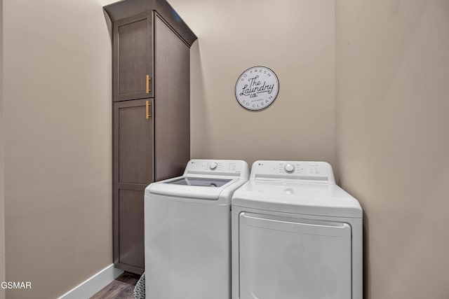 1505 Misty Ct, Sevierville, TN 37862 - laundry area with cabinet space, independent washer and dryer, and wood finished floors