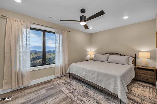 1505 Misty Ct, Sevierville, TN 37862 - bedroom with wood finished floors, ceiling fan, and recessed lighting